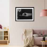 Historic Framed Print, William Partridge standing beside a model of a dirigible hangar,  17-7/8" x 21-7/8"