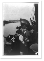 Historic Framed Print, [Harry Houdini on deck on ship being chained and handcuffed],  17-7/8" x 21-7/8"