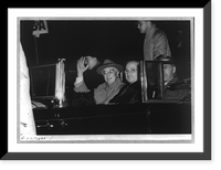 Franklin D. Roosevelt, bust, seated in car, waving, facing slightly left, with Harry Truman and unidentified person returning to Washington on Nov. 10, 1944, Historic Print