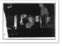Franklin D. Roosevelt, bust, seated in car, waving, facing slightly left, with Harry Truman and unidentified person returning to Washington on Nov. 10, 1944, Historic Print