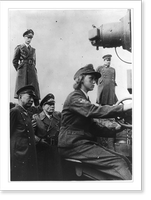 Japanese military attach&eacute; Osaka and General Foerster observing a woman in the German antiaircraft auxiliary operating a searchlight, Vintage Print