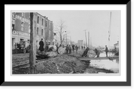 Men rolling barrels of tobacco across platform over water onto the already crowded CORKER for Louisville, Dec. 11, 1919, Antique Print
