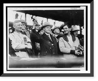 Calvin Coolidge, half length, standing, facing slightly right, holding up baseball at baseball game prior to opening game, 1925. L.to R.: Bill McKechnie, Coolidge, Bucky Harris Classic Wall Art P