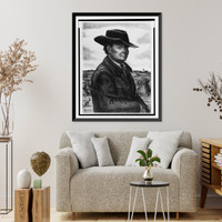 Historic Framed Print, [John Steuart Curry, half-length portrait, holding gun],  17-7/8" x 21-7/8"