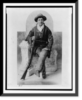 Martha Canary, 1852-1903, (Calamity Jane"), full-length portrait, seated with rifle as General Crook's scout" Classic, Historic Reproduction