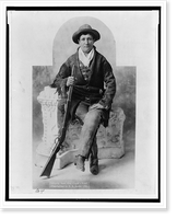 Martha Canary, 1852-1903, (Calamity Jane"), full-length portrait, seated with rifle as General Crook's scout" Classic, Historic Reproduction
