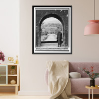 Historic Framed Print, [Kai-Shek Chaing, 1886- , full, standing, in portal, wearing robe, facing front.],  17-7/8" x 21-7/8"