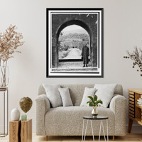 Historic Framed Print, [Kai-Shek Chaing, 1886- , full, standing, in portal, wearing robe, facing front.],  17-7/8" x 21-7/8"