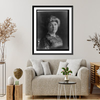 Mrs. Woodrow Wilson (Ellen Axson), full-length portrait, seated, facing right, holding flowers, Historic Reproduction