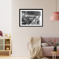 Historic Framed Print, Spinner in Vivian Cotton Mills, Cherryville, N.C. Been at it 2 years. Where will her good looks be in ten years?. Location: Cherryville, North Carolina.,  17-7/8" x 21-7/8"