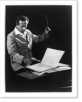 Historic Framed Print, [Antal Dorati, half-length portrait, seated, holding baton and looking at music sheet, facing right],  17-7/8" x 21-7/8"