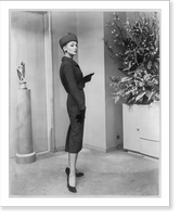 From the Fall 1956 collection of Adele Simpson. an imported wool tweed three-piece suit in Burma Ruby, Vintage Poster