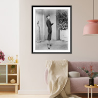 From the Fall 1956 collection of Adele Simpson. an imported wool tweed three-piece suit in Burma Ruby, Vintage Poster