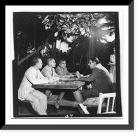 Gov. Marin seated at table and talking with three men, outdoors, Puerto Rico, Antique Wall Art