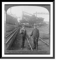 Hydraulic ore-unloaders that lift 1800 tons an hour, and laden lake vessel, Cleveland, Ohio, Antique Print