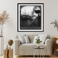 Historic Framed Print, A passing tug showing unloaders at work on both sides of harbor, Conneaut, Ohio,  17-7/8" x 21-7/8"