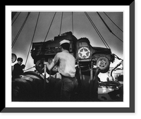 U.S. Coast Guardsmen swing an Army truck overside as their combat transport lies off a bridgehead established by the Americans at Paesternum, just south of Salerno, Italy. Vintage Wall Art Print