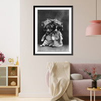 Dogs dressed as humans and posed in human situations: male and female puppies under umbrella Classic, Antique Print