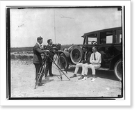 Jack Dempsey at his training camp, June 1921: sitting on auto with man; being filmed Classic, Vintage Wall Art