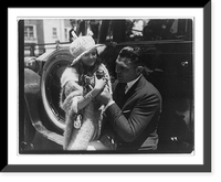 Jack Dempsey at his training camp, June 1921: with small girl; holding tiny monkey, Historic Reproduction