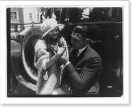 Jack Dempsey at his training camp, June 1921: with small girl; holding tiny monkey, Historic Reproduction