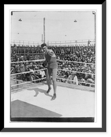 Jack Dempsey at his training camp, June 1921: shadow-boxing in ring; spectators in background, Vintage Print