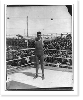 Jack Dempsey at his training camp, June 1921: standing in ring with arms spread wide, Antique Wall Art