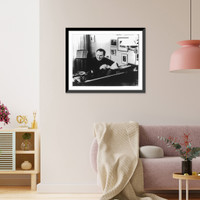 Historic Framed Print, [Isaac Stern, 1920- , head-and-shoulders portrait, seated at piano, facing left],  17-7/8" x 21-7/8"