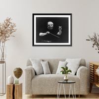 Historic Framed Print, [Eugene Ormandy, 1899- , half-length, standing, facing right, conducting the Philadelphia symphony during a rehearsal],  17-7/8" x 21-7/8"