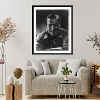 Historic Framed Print, [Gene Kelly, 1912- , head-and-shoulders portrait, facing left],  17-7/8" x 21-7/8"