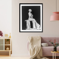 Claudia Dell, full-length portrait, seated, facing left, nude, with cloth over part of her body, Historic Print