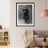 Enrico Caruso, 1873-1921, full-length portrait, standing, facing left, wearing fur coat and holding lantern, Vintage Poster