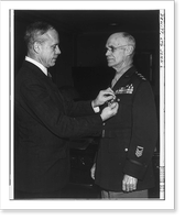 John Lesesne DeWitt, 1880- , half-length portrait, standing, facing left, receiving second Oak Leaf Cluster from Secretary of War Robert P. Patterson, Historic Reproduction