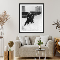 Snow time is playtime for Lew Kosloff and Peggy Leaf Lew Kosloff washing Miss Leaf's face with snow, Chicago, Ill, Vintage Poster