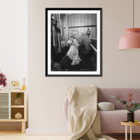Margaret Anglin, 1876- , full length, seated, facing front; reading a book, Antique Print