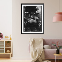 Historic Framed Print, [Ethel Barrymore, 1879-1959, head and shoulders, facing slightly left; behind bouquet of flowers],  17-7/8" x 21-7/8"