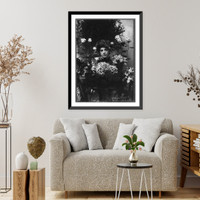 Historic Framed Print, [Ethel Barrymore, 1879-1959, head and shoulders, facing slightly left; behind bouquet of flowers],  17-7/8" x 21-7/8"