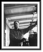 John Daniel Rust, 1892-1954, half-length portrait, standing, facing left; operating mahcine. Inventor of the cotton picker, Antique Poster
