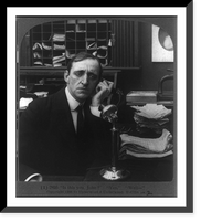 Historic Framed Print, Man in office on telephone with disappointed look: Is this you,  John?" "Yes." "Well. "",  17-7/8" x 21-7/8"