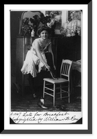 Historic Framed Print, [Young woman in glamourous, erotic poses: Late for Breakfast" - in negligee,  putting on high-button shoes]",  17-7/8" x 21-7/8"