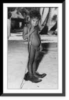 Natives of Bikini Island before atomic bomb test: naked boy wearing very large shoes, Historic Print