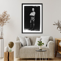 Historic Framed Print, Frank Bryant, full length, standing, facing left, on roller skates,  17-7/8" x 21-7/8"