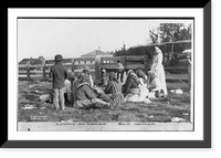 Indians gambling outdoors, seated on ground and playing cards, Ely, Nevada: Lucky at cards, Vintage Poster