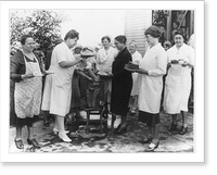 Group of farm women holding plates of cake and ice cream and spooning homemade ice cream out of freezers, Vintage Poster