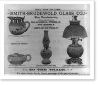 Advertisement for Smith-Brudewold Glass Co., illustrated with three lamps and a Japanese syrup pitcher, Vintage Wall Art