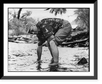James Michner in Hawaii, May 1954: bent over in shallow water with pants rolled up, Antique Poster