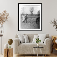Henry Truvillion and wife, in the garden, near Newton, Texas, Antique Poster