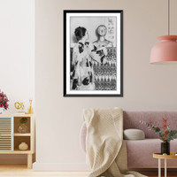 Woman in a kimono standing looking at a sculpted bust.EW, Antique Print