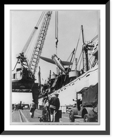 New York Port of Embarkation during World War II: Loading a P-47 is a ticklish job- loading an airplane on a ship Classic, Historic Print