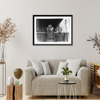 Historic Framed Print, Oldest girl, Minnie Carpenter, House 53 Loray Mill, Gastonia, N.C. Spinner. Makes fifty cents a day of 10 hours. Works four sides. Younger girl works irregularly. Location: Gastonia, North Carolina.,  17-7/8" x 21-7/8"